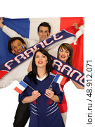 Four avid French sport fans. Стоковое фото, агентство Ingram Publishing / Фотобанк Лори