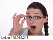 Glasses wearing brunette amazed. Стоковое фото, агентство Ingram Publishing / Фотобанк Лори