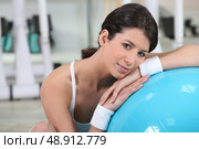 young woman reposing after fitness. Стоковое фото, агентство Ingram Publishing / Фотобанк Лори