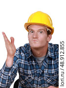 Tradesman looking ready to hit somebody. Стоковое фото, агентство Ingram Publishing / Фотобанк Лори