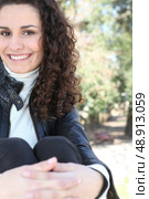 Woman relaxing in a park. Стоковое фото, агентство Ingram Publishing / Фотобанк Лори
