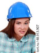 Young woman laborer grimacing. Стоковое фото, агентство Ingram Publishing / Фотобанк Лори