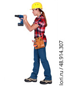 Woman with drill. Стоковое фото, агентство Ingram Publishing / Фотобанк Лори