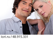 a man and a woman being accomplices. Стоковое фото, агентство Ingram Publishing / Фотобанк Лори