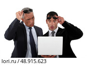 Two businessmen with shocked expression on face. Стоковое фото, агентство Ingram Publishing / Фотобанк Лори