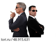 Cocky men in smart suit. Стоковое фото, агентство Ingram Publishing / Фотобанк Лори