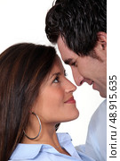 Faces of a couple in love. Стоковое фото, агентство Ingram Publishing / Фотобанк Лори