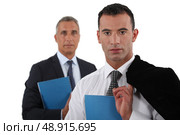 Young businessman posing with his boss. Стоковое фото, агентство Ingram Publishing / Фотобанк Лори