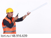 Concerned traffic guard reporting a problem. Стоковое фото, агентство Ingram Publishing / Фотобанк Лори