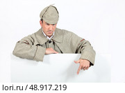 a detective showing a copyspace. Стоковое фото, агентство Ingram Publishing / Фотобанк Лори