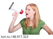 Woman with a loudspeaker. Стоковое фото, агентство Ingram Publishing / Фотобанк Лори