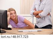 Young woman sprawling on her desk. Стоковое фото, агентство Ingram Publishing / Фотобанк Лори