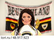 Brunette Germany fan. Стоковое фото, агентство Ingram Publishing / Фотобанк Лори