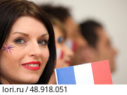 Row of French football supporters. Стоковое фото, агентство Ingram Publishing / Фотобанк Лори