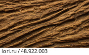 Close up view of textured rock surface showing natural stratification pattern. Earthy background and abstract structure for geology concept. Стоковое AI-изображение, AI-художник Анжелика Самсонова / Фотобанк Лори