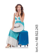Woman going to summer vacation isolated on white. Стоковое фото, агентство Ingram Publishing / Фотобанк Лори