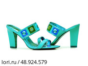 Green Female shoes on white background. Стоковое фото, агентство Ingram Publishing / Фотобанк Лори