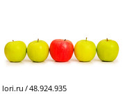 Stand out from crowd concept with apples isolated on white. Стоковое фото, агентство Ingram Publishing / Фотобанк Лори