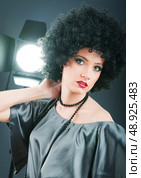 Young attractive girl with afro curly haircut. Стоковое фото, агентство Ingram Publishing / Фотобанк Лори