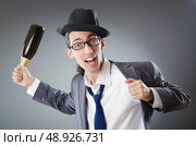 Businessman with bottle of champagne. Стоковое фото, агентство Ingram Publishing / Фотобанк Лори