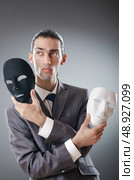 Industrial espionate concept with masked businessman. Стоковое фото, агентство Ingram Publishing / Фотобанк Лори