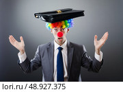 Clown businessman in funny business concept. Стоковое фото, агентство Ingram Publishing / Фотобанк Лори