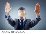 Businessman blinded with money. Стоковое фото, агентство Ingram Publishing / Фотобанк Лори