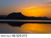 Denia Las Marinas sunset beach in Punta Molins at Alicante Mediterranean Spain. Стоковое фото, агентство Ingram Publishing / Фотобанк Лори