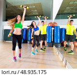 zumba dance cardio people group training at fitness gym workout exercise. Стоковое фото, агентство Ingram Publishing / Фотобанк Лори