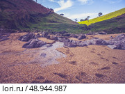 Water flowing on the beach. Стоковое фото, агентство Ingram Publishing / Фотобанк Лори