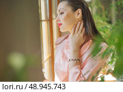 Smart lady in the luxury apartment. Стоковое фото, агентство Ingram Publishing / Фотобанк Лори
