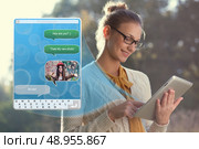 Concept of using wireless technology, video call, typing message on ipad. Incoming call. interface of tablet pc. Стоковое фото, агентство Ingram Publishing / Фотобанк Лори