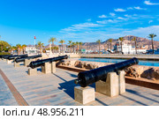 Cartagena cannon in naval museum with port at Murcia Spain. Стоковое фото, агентство Ingram Publishing / Фотобанк Лори