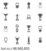 Trophy icons black set of champion medallion winner prize first place laurel wreath isolated vector illustration. Стоковая иллюстрация, агентство Ingram Publishing / Фотобанк Лори