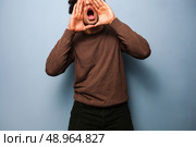 Young man shouting. Стоковое фото, агентство Ingram Publishing / Фотобанк Лори