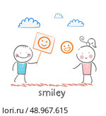 man and girl holding posters with fun emoticons. Стоковая иллюстрация, агентство Ingram Publishing / Фотобанк Лори