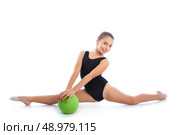 Kid girl ball rhythmic gymnastics exercise on white background. Стоковое фото, агентство Ingram Publishing / Фотобанк Лори