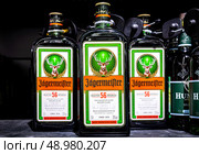 Jagermeister is a strong alcoholic beverage for sale in superstore. Jagermeister made with 56 herbs. Редакционное фото, фотограф FotograFF / Фотобанк Лори