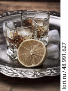 glass carafe with alcoholic drink of whiskey vintage style. Стоковое фото, агентство Ingram Publishing / Фотобанк Лори