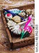 wooden box with a set of old Soviet glass toys. Стоковое фото, агентство Ingram Publishing / Фотобанк Лори