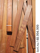 Ipe teak decking deck wood installation clips fasteners. Стоковое фото, агентство Ingram Publishing / Фотобанк Лори