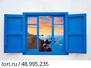 Almeria view from blue window of Cabo de Gata photo mount. Стоковое фото, агентство Ingram Publishing / Фотобанк Лори