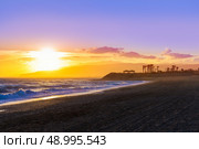 Almeria Cabo de Gata sunset in Retamar beach at Spain. Стоковое фото, агентство Ingram Publishing / Фотобанк Лори