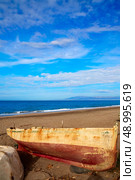 Almeria Cabo de Gata beached boats in San Miguel beach of Spain. Стоковое фото, агентство Ingram Publishing / Фотобанк Лори