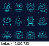 Monograms shields design set on dark blue background flat isolated vector illustration . Monograms shields set. Стоковая иллюстрация, агентство Ingram Publishing / Фотобанк Лори