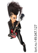 Rock musician in leather clothing isolated. Стоковое фото, агентство Ingram Publishing / Фотобанк Лори