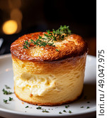 Savory Cheese Souffl Garnished With Fresh Thyme on White Plate in a Dark Setting. Стоковое AI-изображение, AI-художник Юлия Гапеенко / Фотобанк Лори