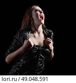 Young beautiful vampire woman isolated. Стоковое фото, агентство Ingram Publishing / Фотобанк Лори