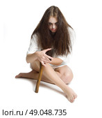 Zombie girl with axe isolated. Стоковое фото, агентство Ingram Publishing / Фотобанк Лори