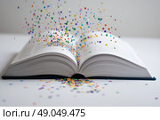 Фантазия книги: взрыв цвета и слов. Стоковое AI-изображение, AI-художник Александр Жуков / Фотобанк Лори